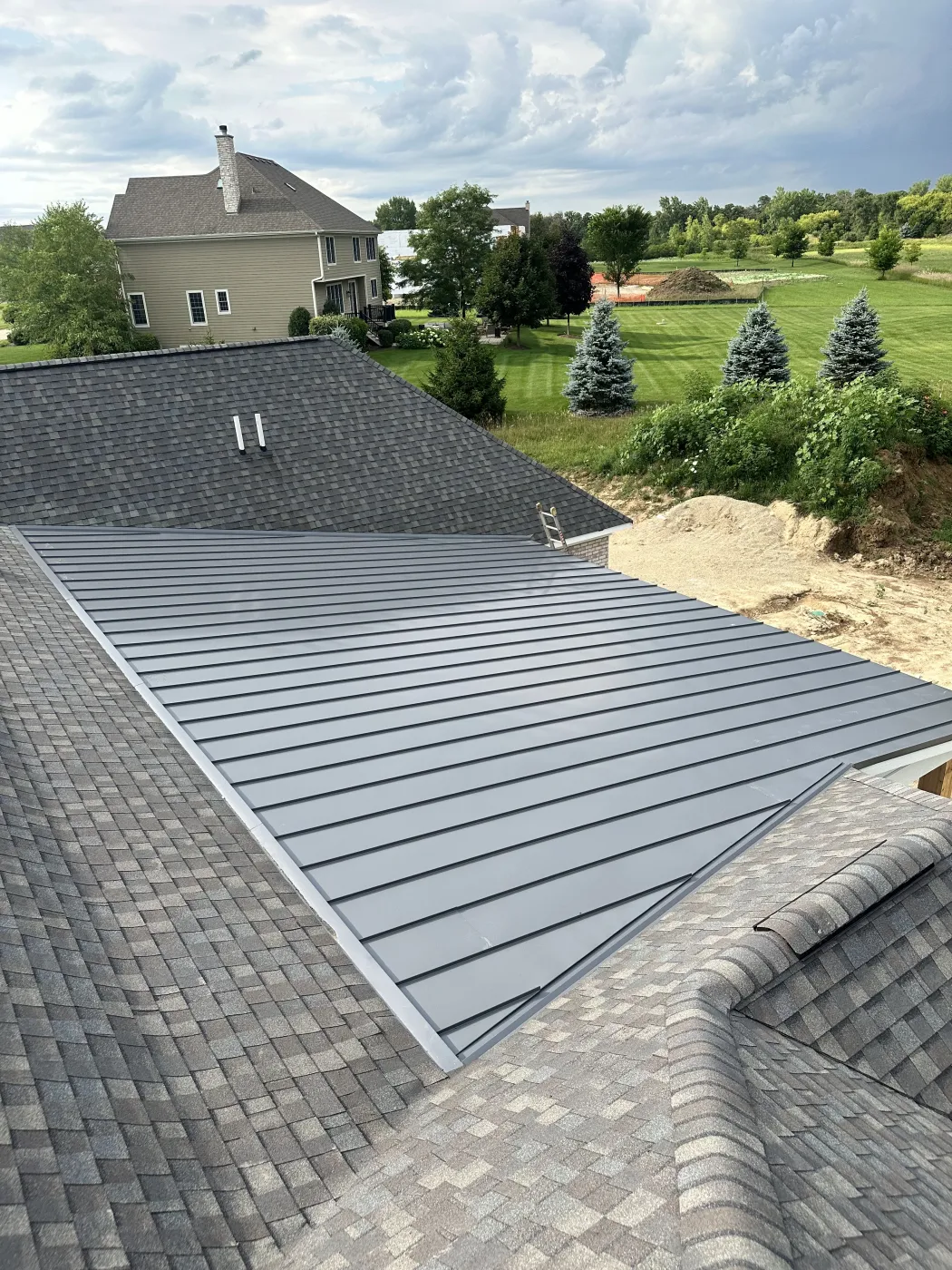 new construction asphalt shingle roof standing seam metal roof apex exteriors