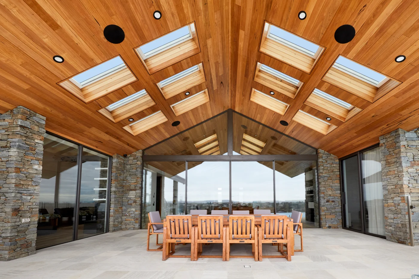 12 Velux Sky Lights On Patio Stone Pillars Wood Ceiling
