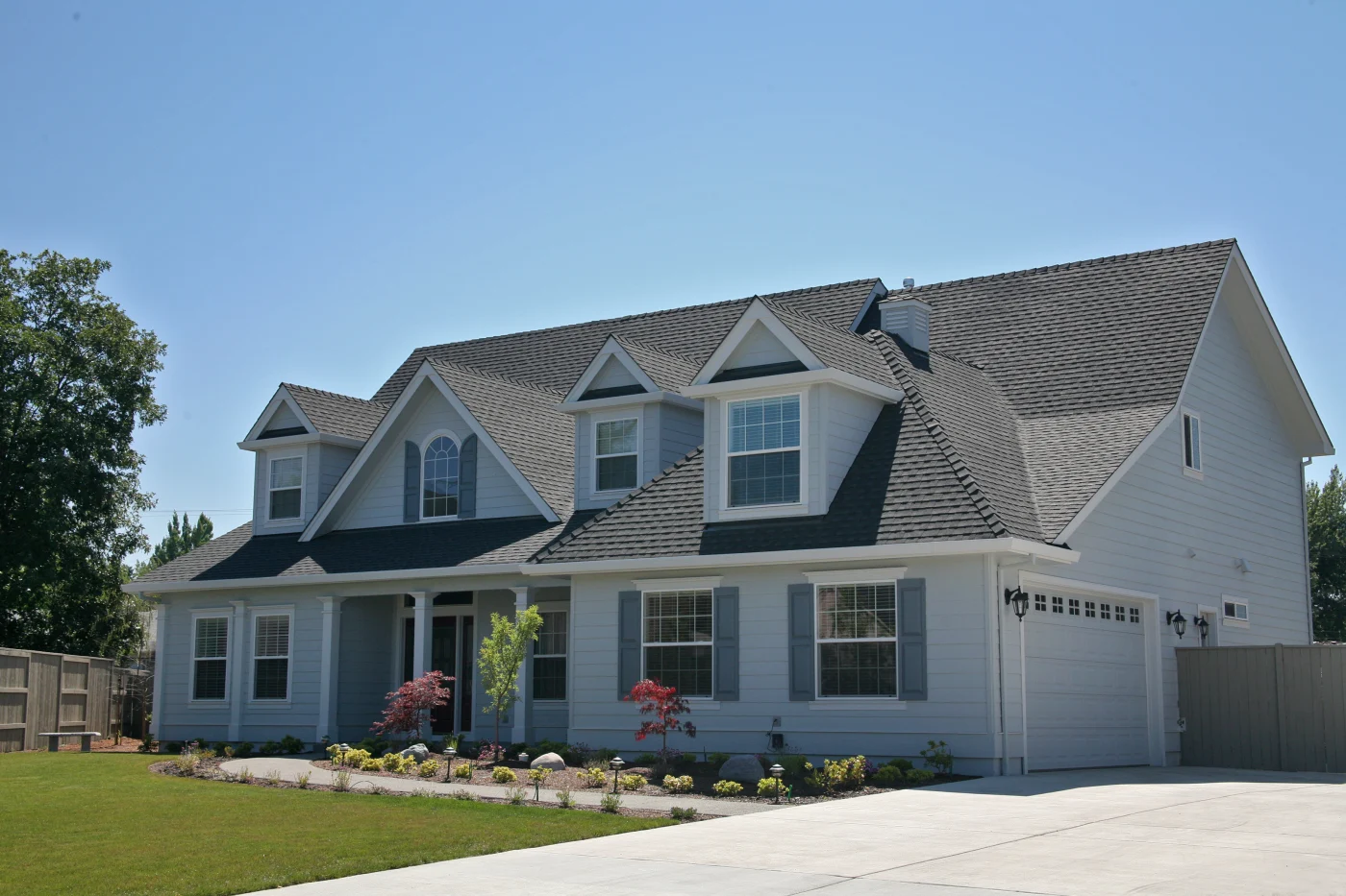A golf course clubhouse has a new roof and updated siding.