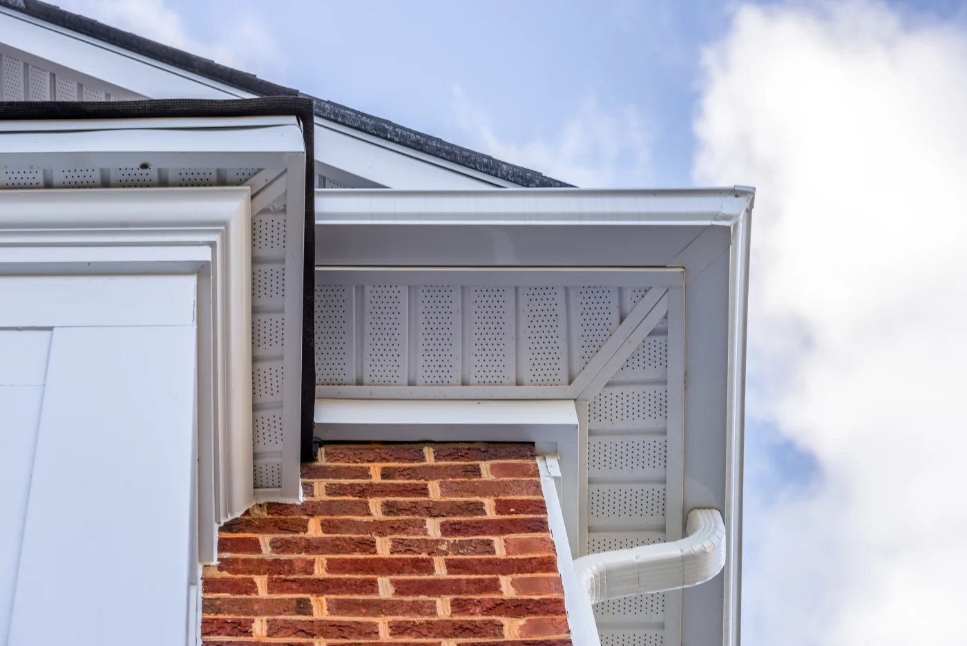View of a home’s gutters from below