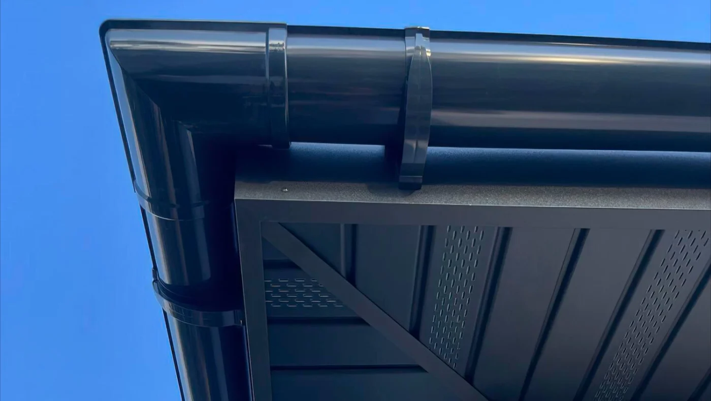 Image of black gutters and soffit on a commercial building