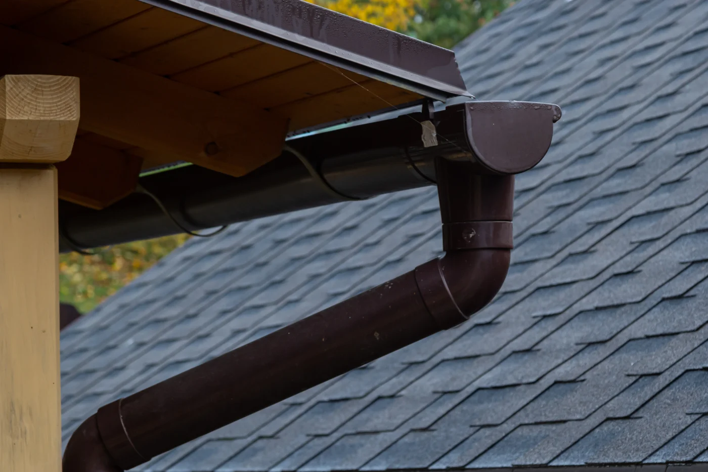 Holder Gutter Drainage System On The Roof. Drain On The Roof Of The House. Roof Drainage. Water Drainage From The Roof