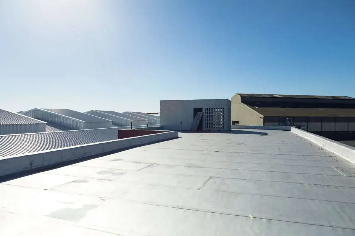 A bird's eye view of a medical resort with a new roof.