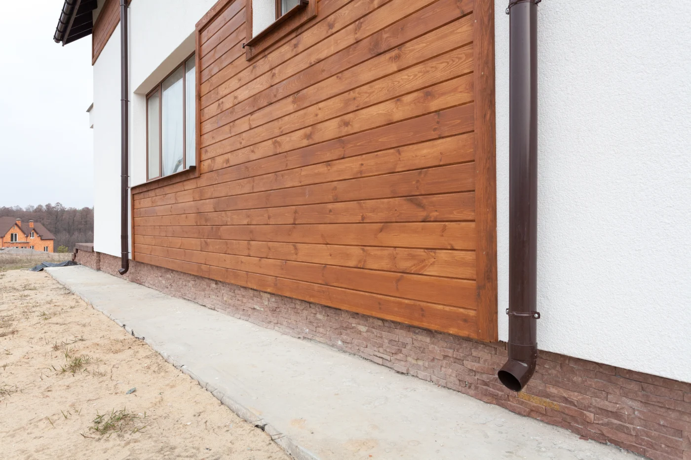 Gorgeous wood-like siding placed onto home newly constructed