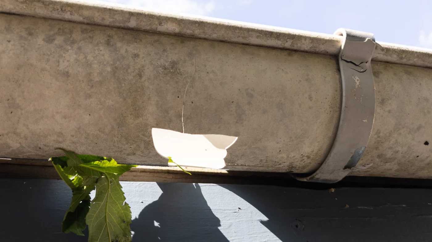 Broken Roof Gutter Needs To Repair Rain Gutters Damage On House