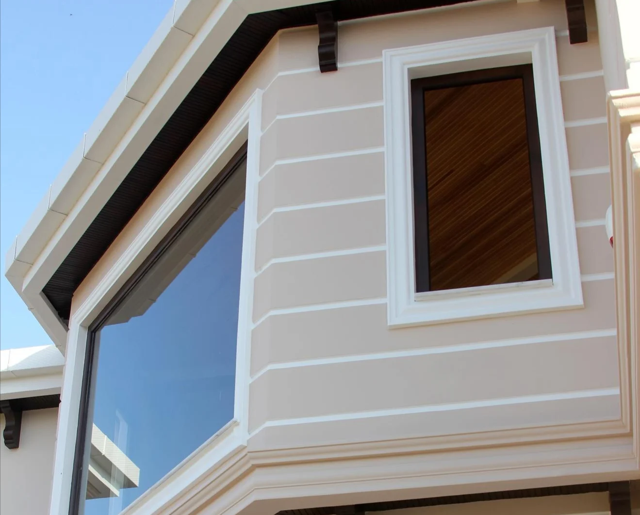 Image of a house with new upper-story windows