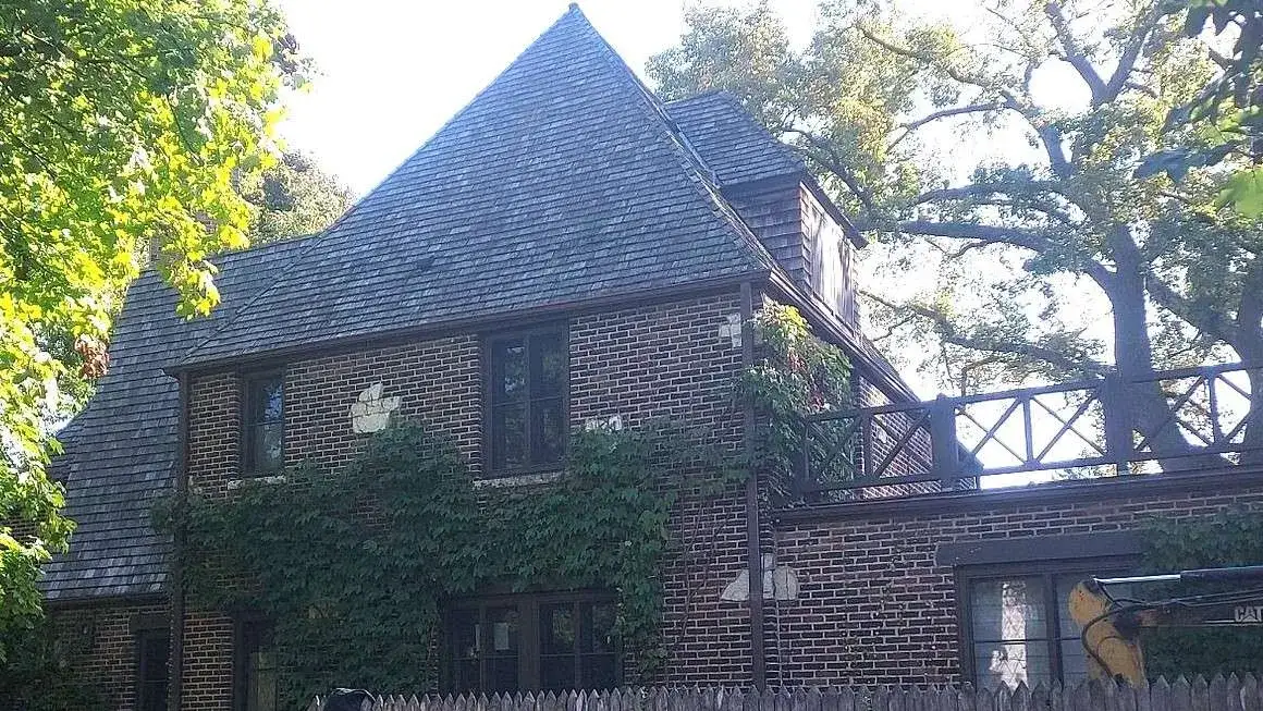 Wide view of John’s home with its old cedar shingles still in place