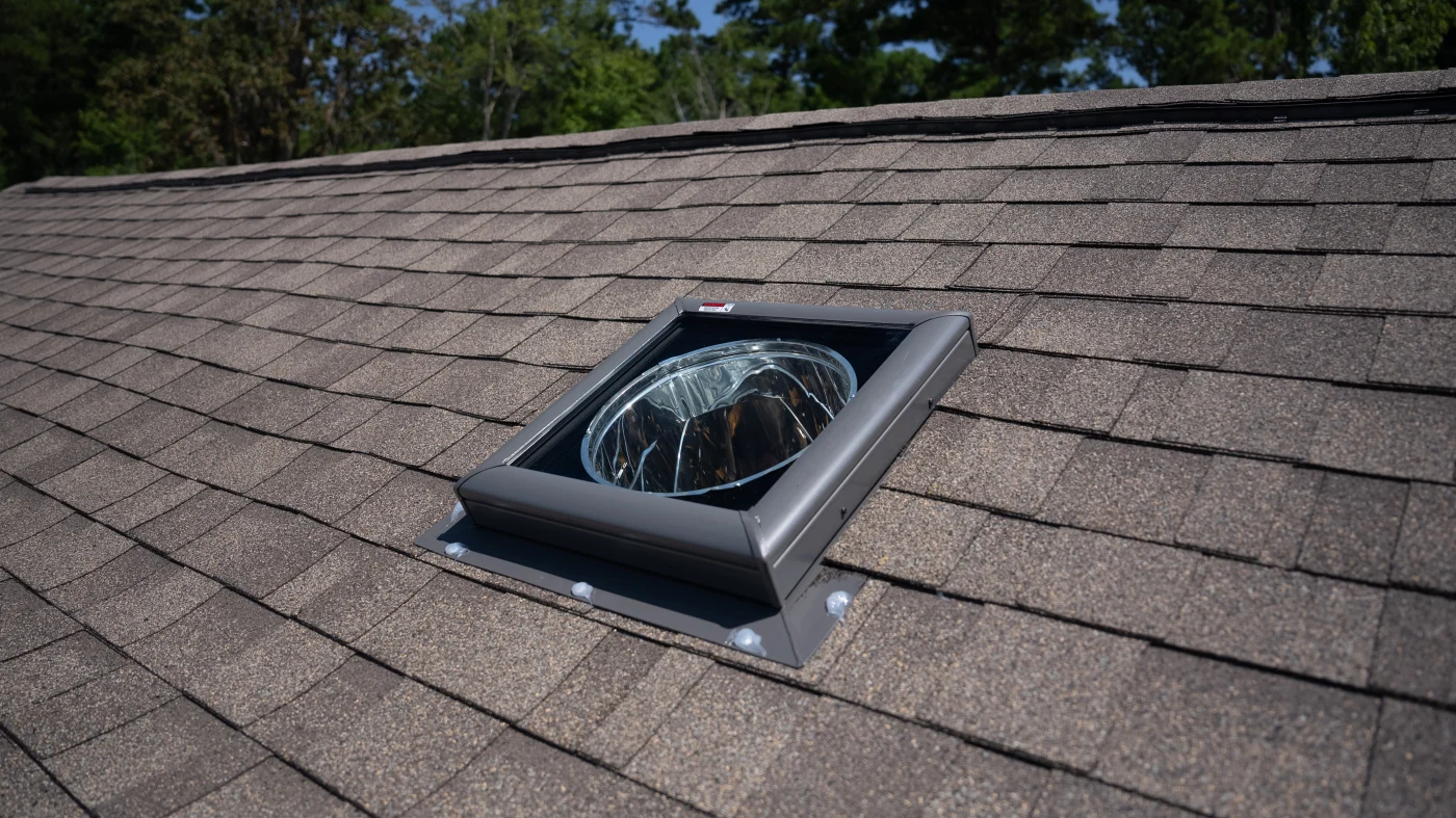 A close-up shot of a Velux skylight professionally installed.