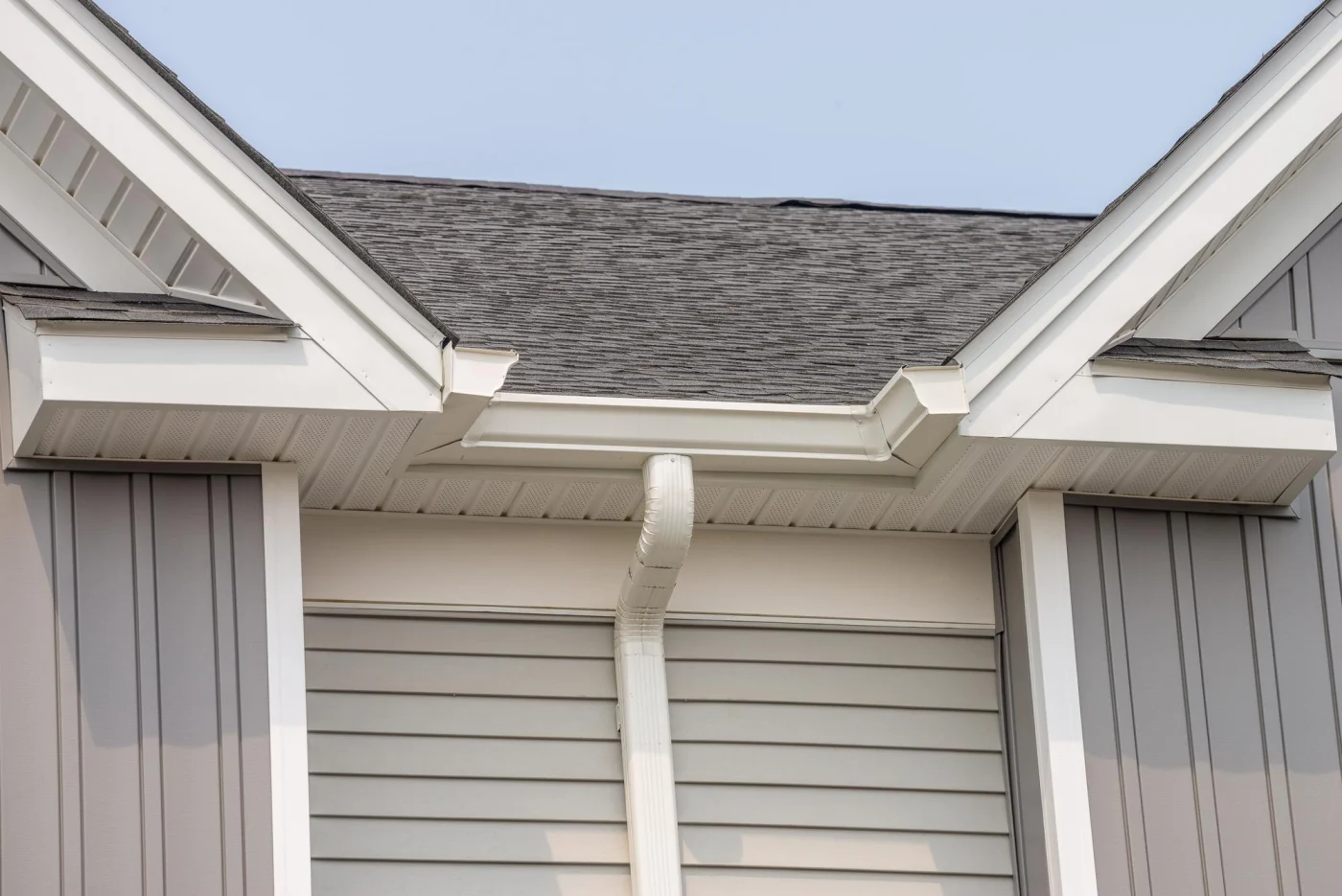 A view of a residential home, focusing on the well-installed gutters.