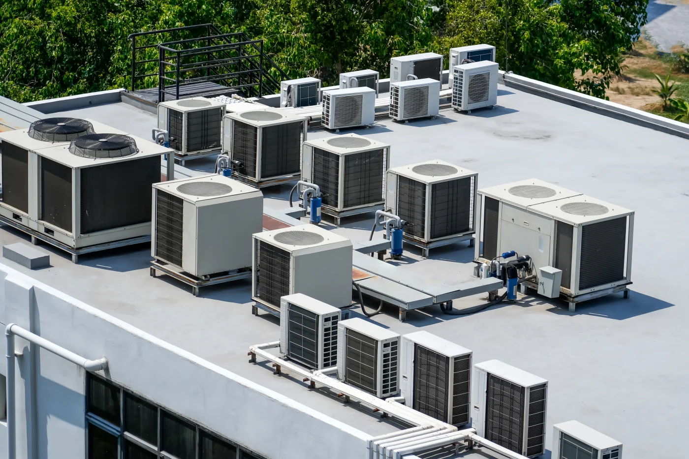 Large commercial roof with lots of HVAC units on top