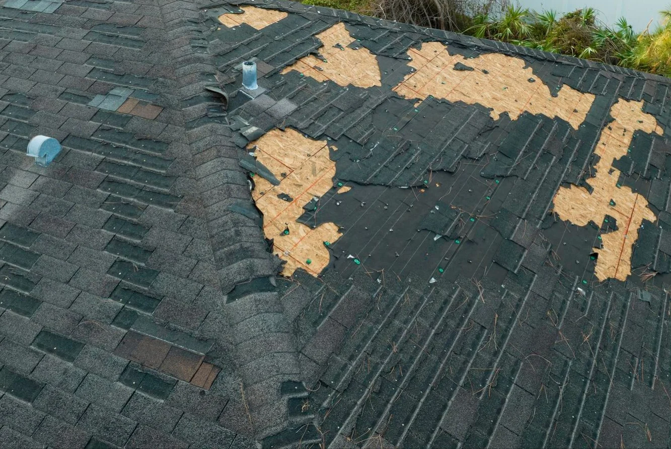 Image of missing shingles on roof