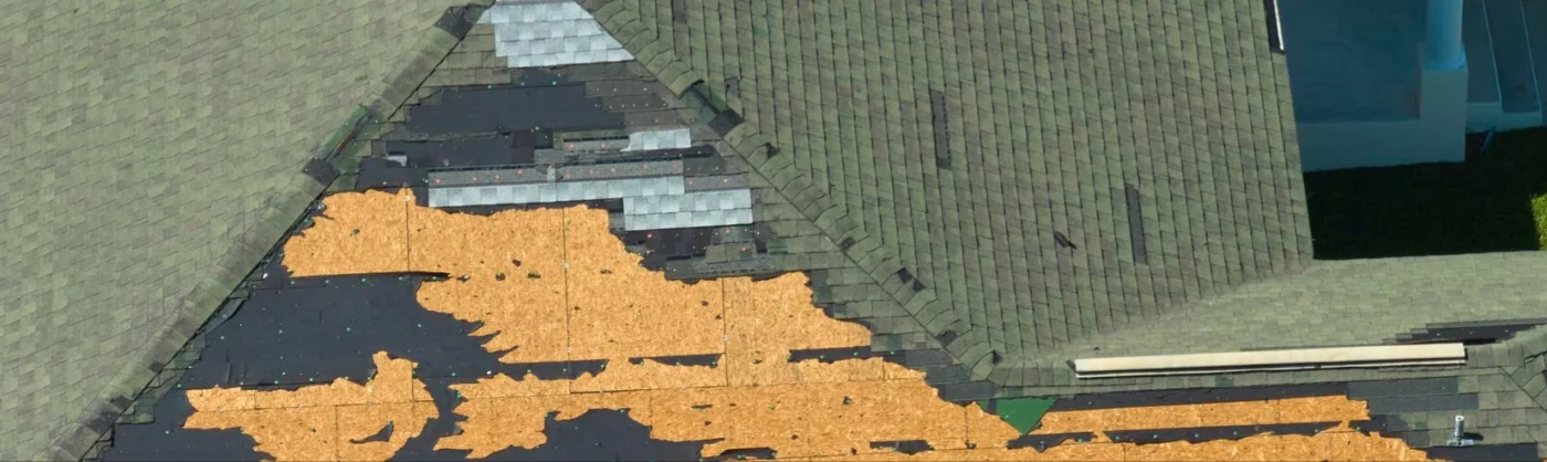Aerial image of a roof with missing shingles