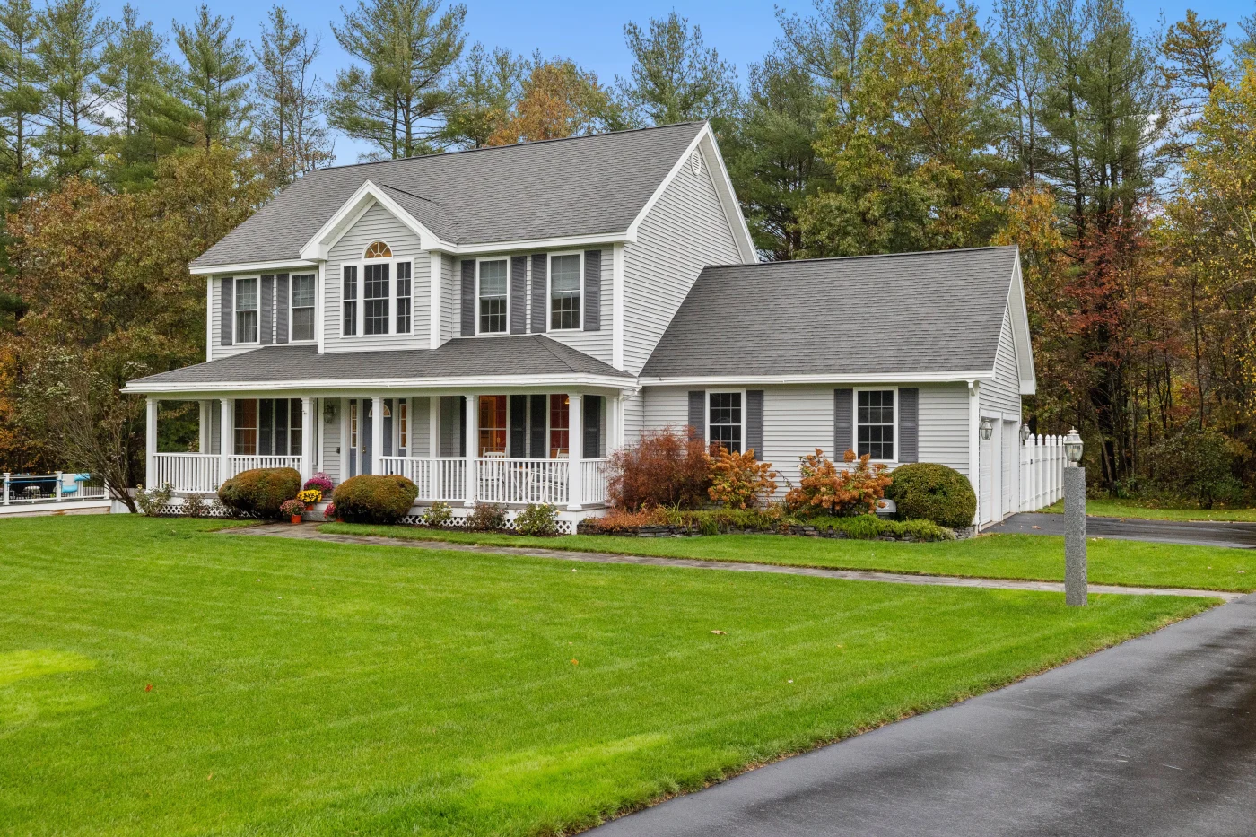 Far-off image of a house with a newly completed roof