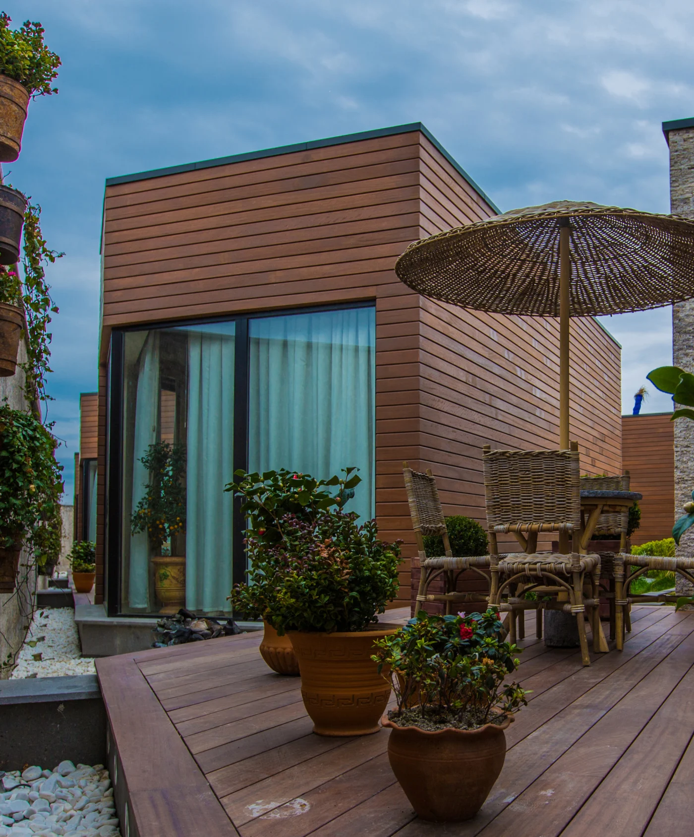Gorgeous home with sage siding and black asphalt roof