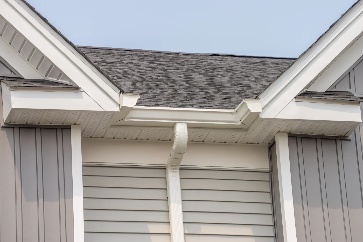 Image of white soffits, fascia, and gutters on a house