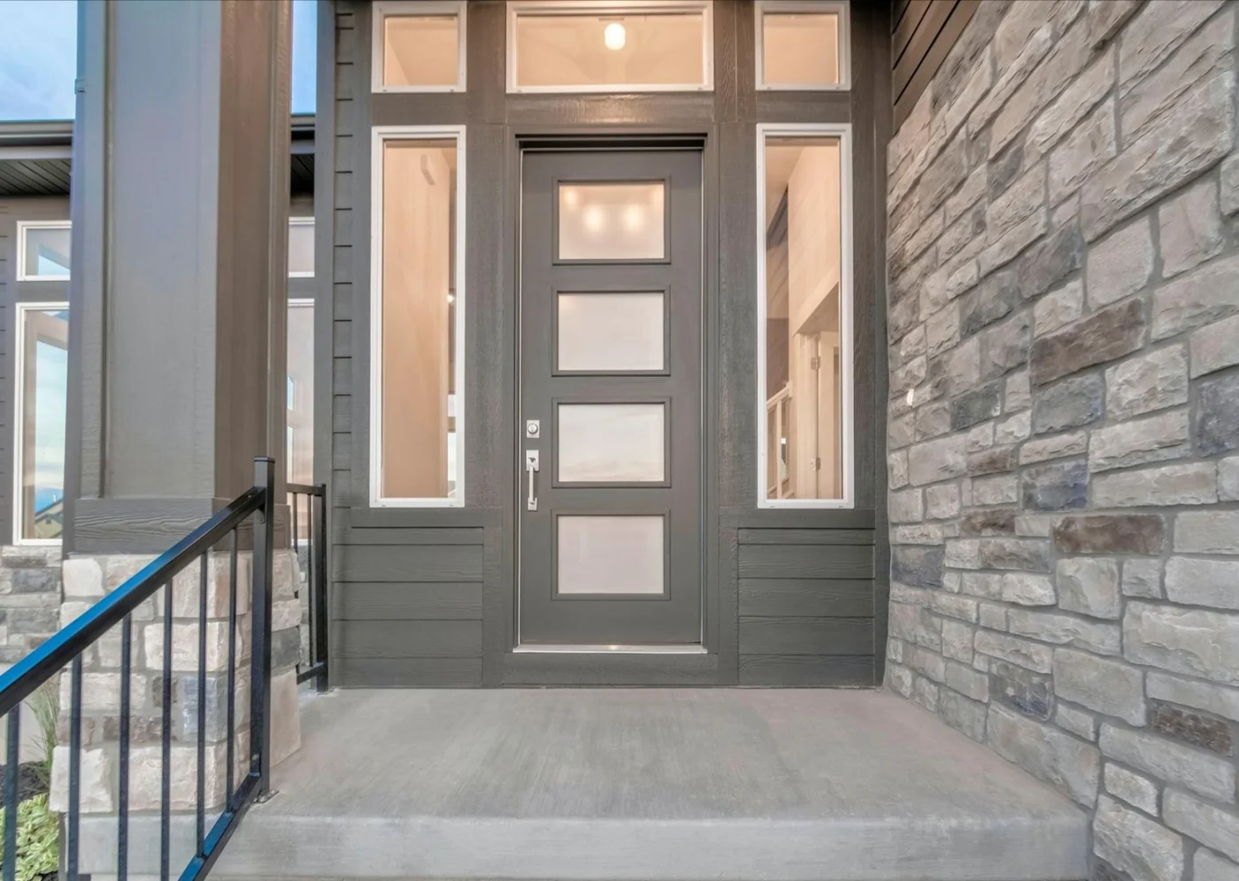 Image of a house entry lined with a stone veneer