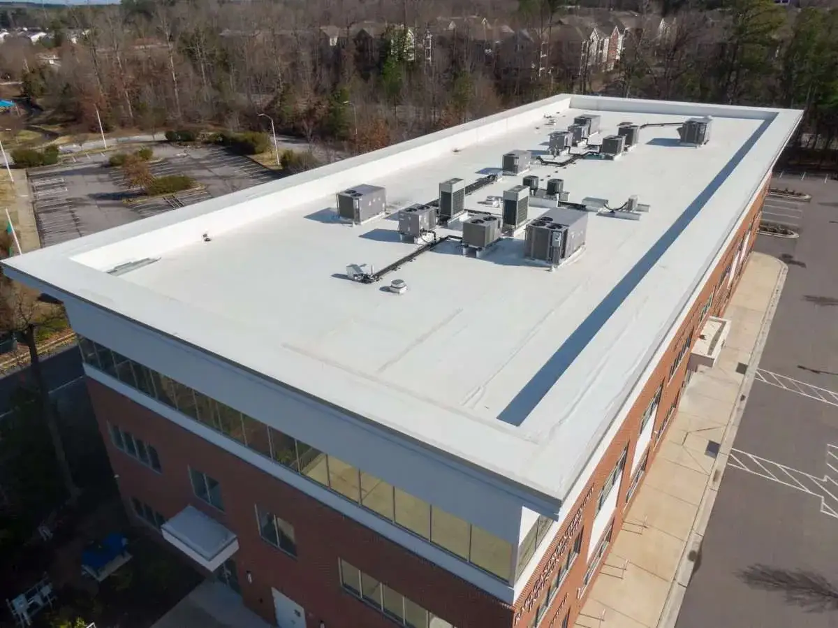 An aerial shot of an apartment complex sprawled out to cover a lot of area.