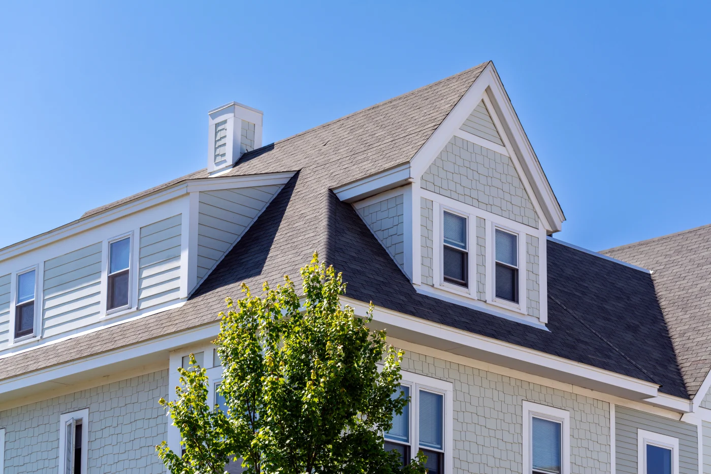 House with fiber cement siding and asphalt shingle roof