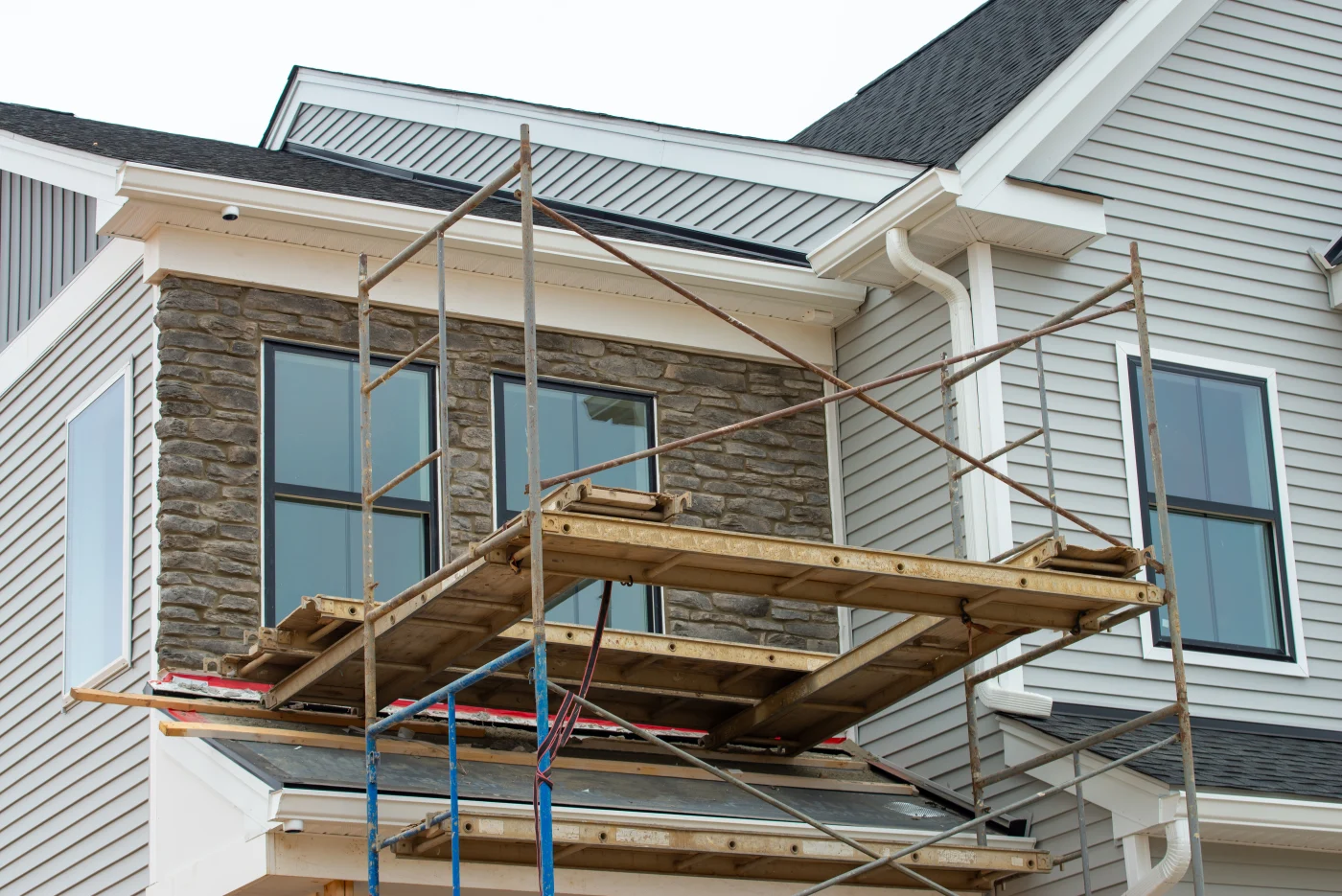 Scaffolding Near The Wall Of The House