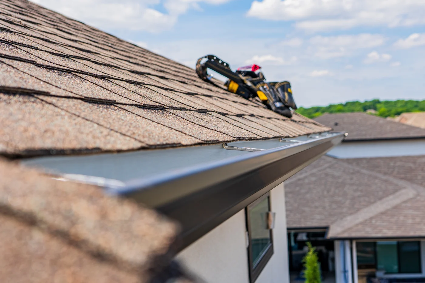 Close-up of gutters on a shingle roof
