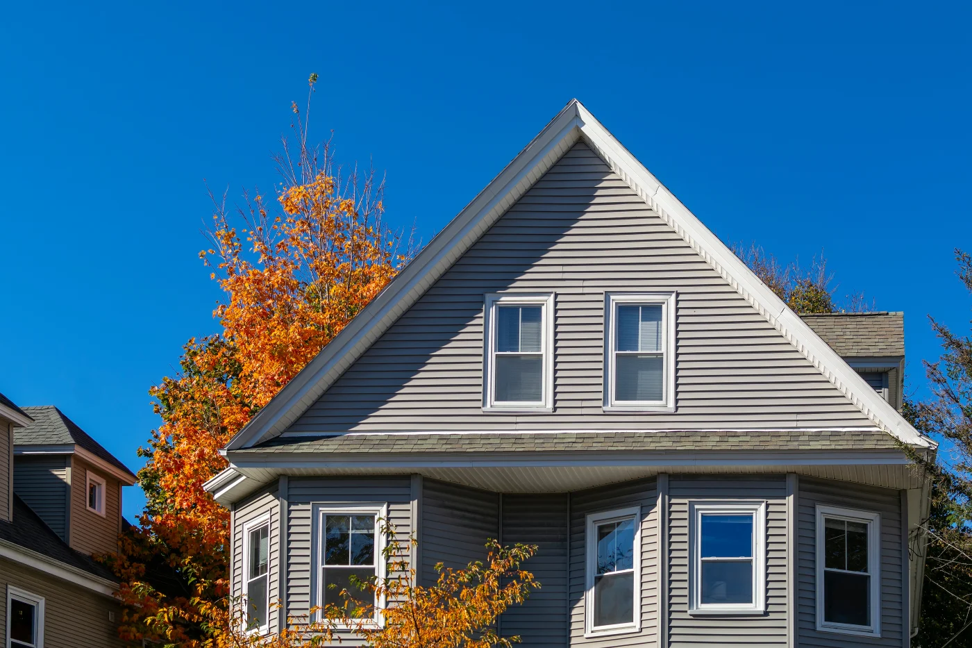 Two-story house with gray siding