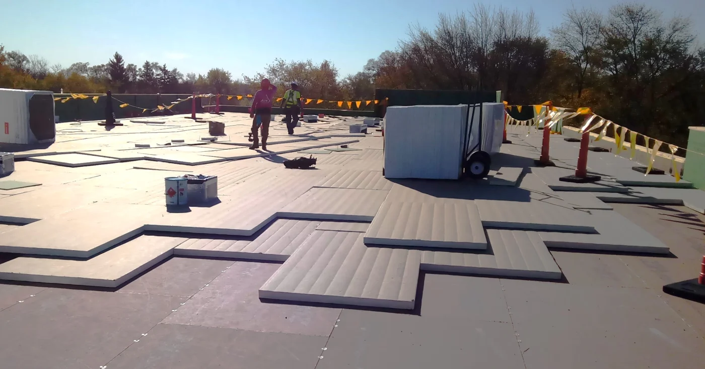 A flat roof installation in progress.