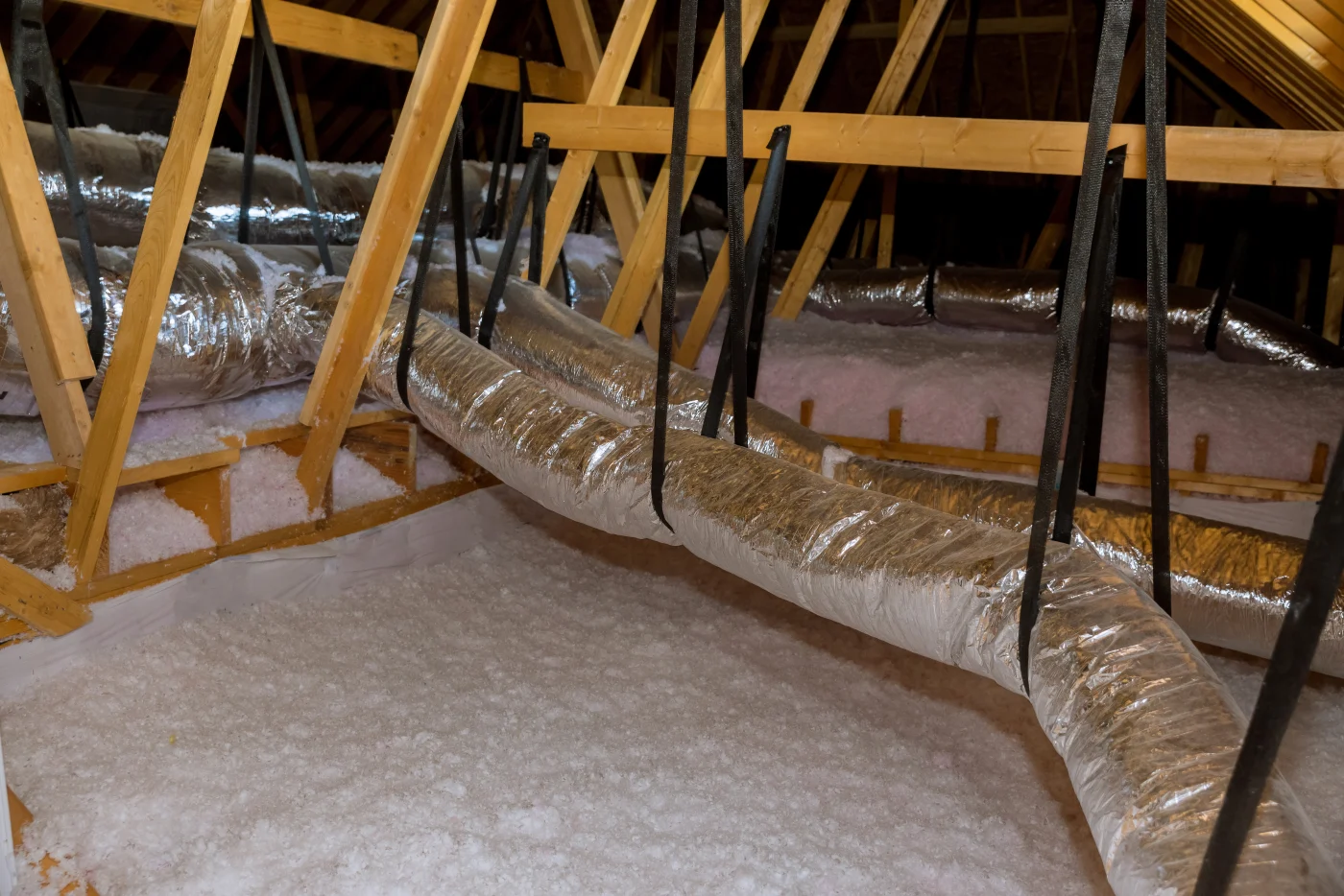 An attic with properly installed blown-in attic insulation.