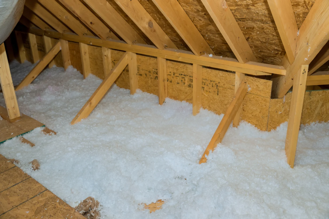 An attic with properly installed blown-in insulation.