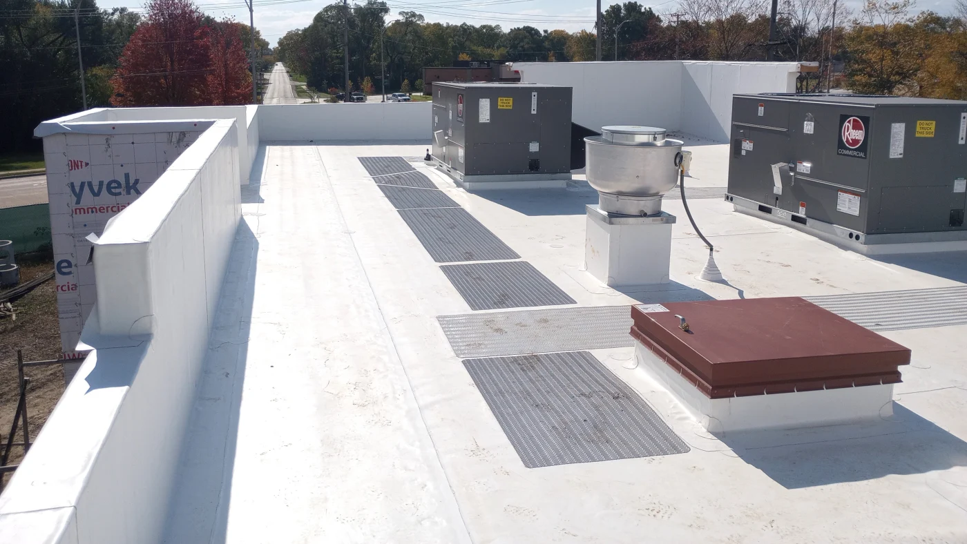 The rooftop of a commercial building after a roof replacement in Elmhurst, IL by Apex Exteriors.