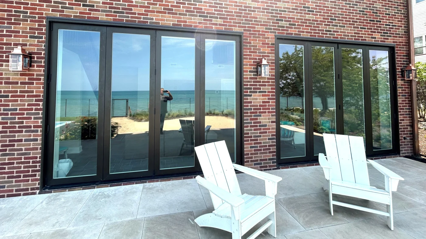 Multi-pane windows on a house with brick siding in Glenview, IL by Apex Exteriors.