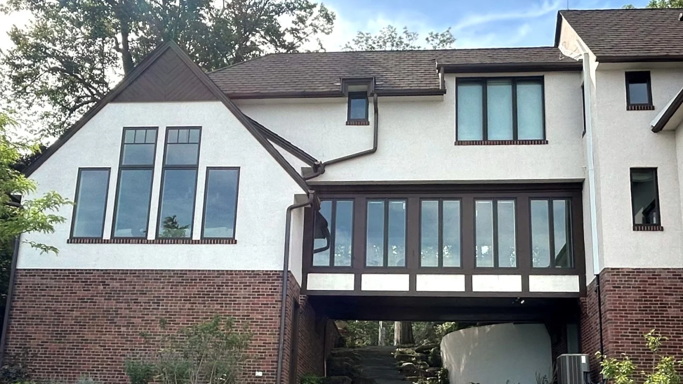 A large house with multiple windows in Lombard, IL by Apex Exteriors.