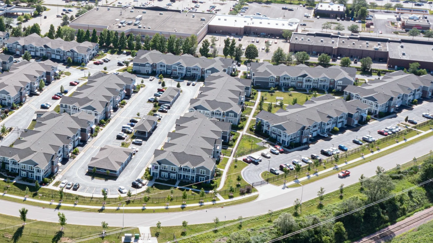 Dependable Multi-Family Exterior Experts | Plainfield, IL | Apex Exteriors, Inc. A sky view of a large apartment complex in Plainfield, IL, by Apex Exteriors, Inc.