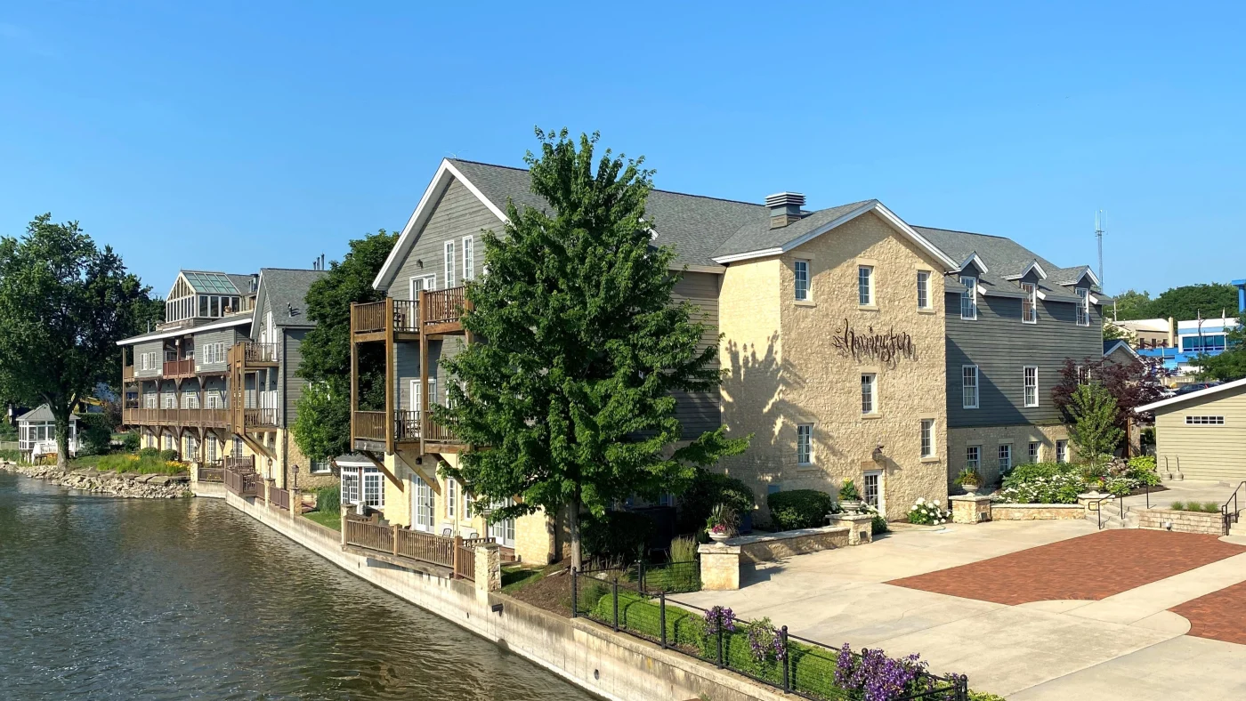 Exceptional Commercial Roofing Services | Plainfield, IL | Apex Exteriors, Inc. A hotel with a gray roof in Plainfield, IL, by Apex Exteriors, Inc.