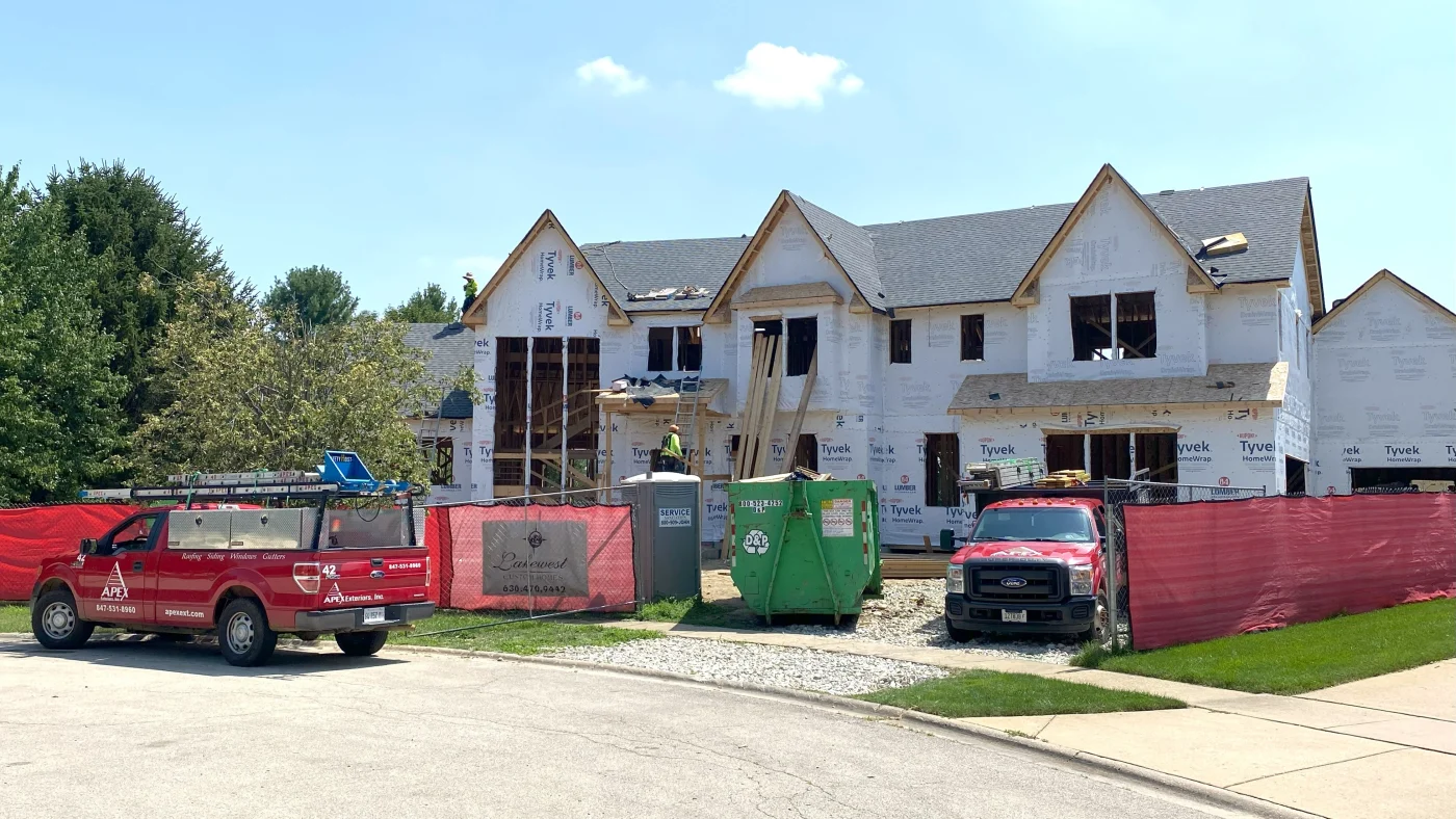 Masterful New Home Construction | Plainfield, IL | Apex Exteriors, Inc. The front of a house under construction in Plainfield, IL, by Apex Exteriors, Inc.