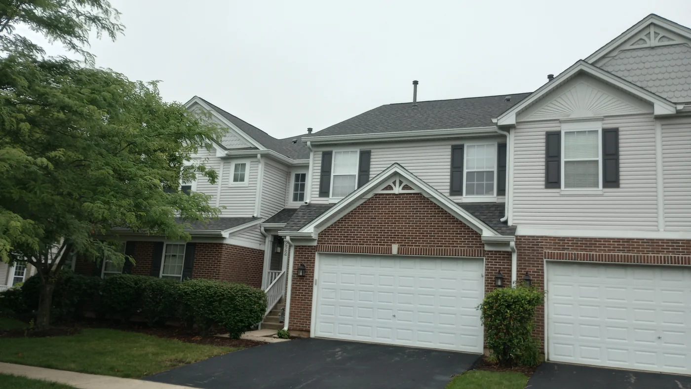 Outstanding HOA Exterior Services | Plainfield, IL | Apex Exteriors, Inc. The front of connected houses in a suburb in Plainfield, IL, by Apex Exteriors, Inc.