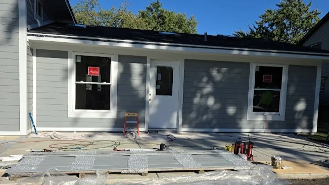 Outstanding Window Replacement | Bloomingdale, IL | Apex Exteriors, Inc. The front of a house with new windows in Bloomingdale, IL, by Apex Exteriors, Inc.