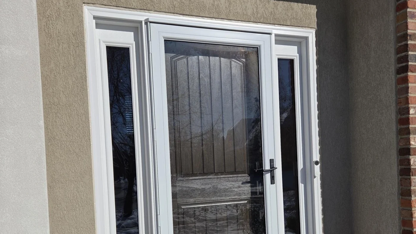 Stunning Replacement Entry Door Services | Bloomingdale, IL | Apex Exteriors, Inc. A close-up of a beautiful brown front entry door in Bloomingdale, IL, by Apex Exteriors, Inc.