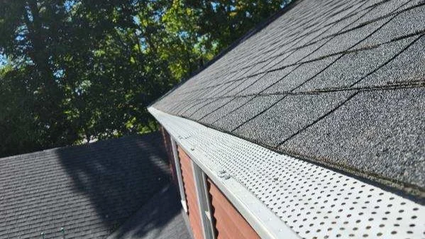Outstanding Gutter Installation | Elgin, IL | Apex Exteriors Inc. Seamless gutter installation with protective gutter guards, designed to improve drainage, reduce debris buildup, and help protect the roof and foundation.