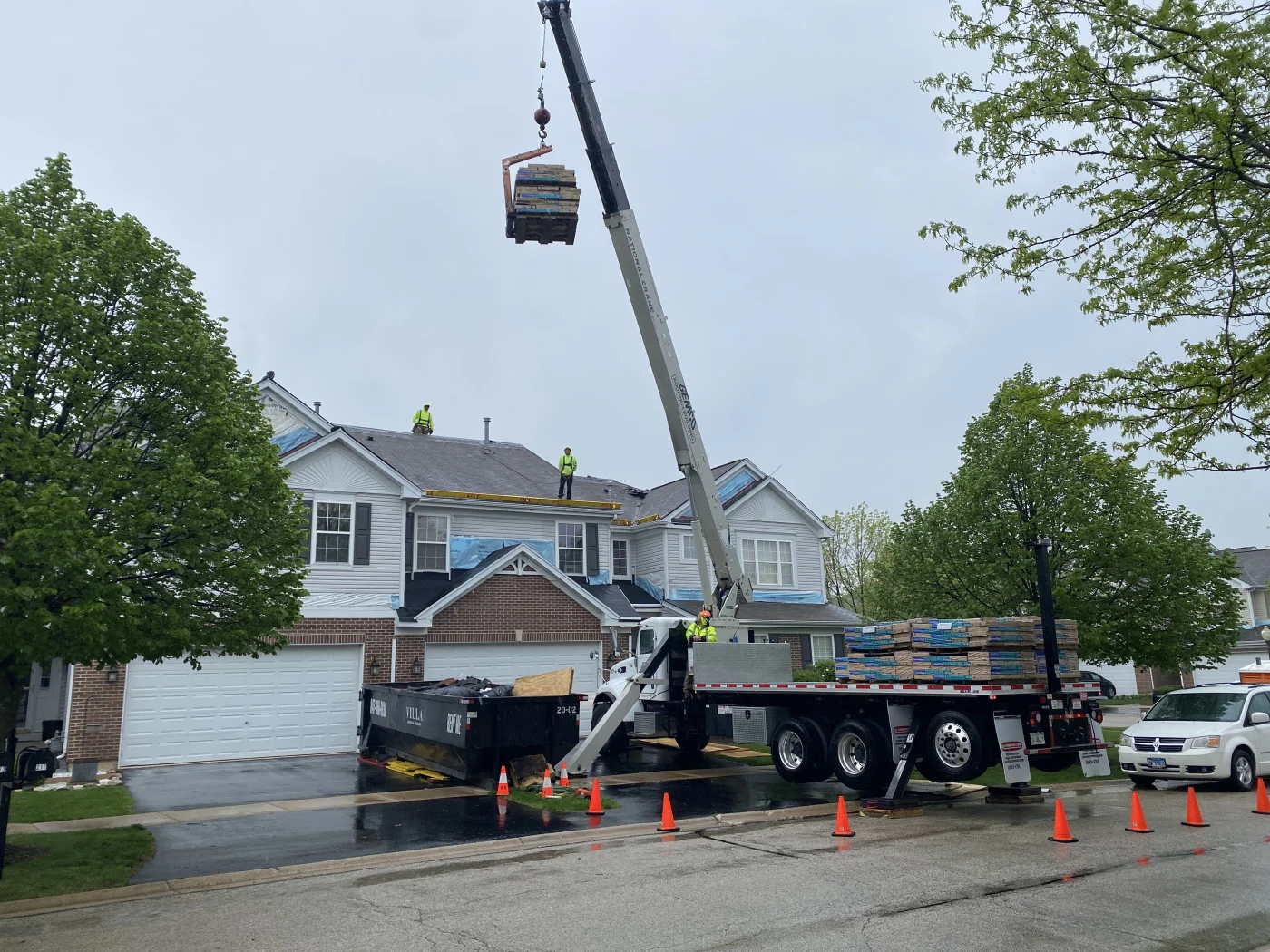 HOA community in South Elgin having new roof installed and siding repairs performed.