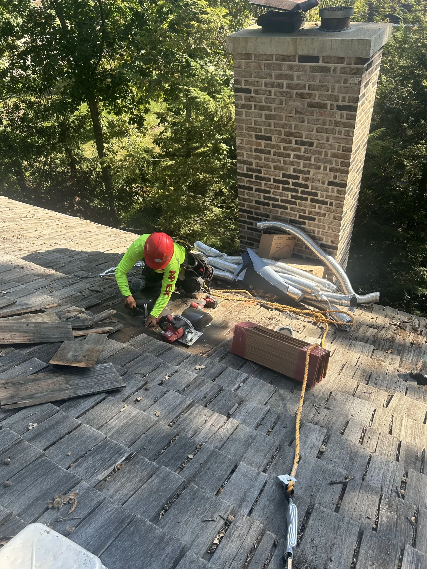 Cedar shake roof being repaired in Schaumburg