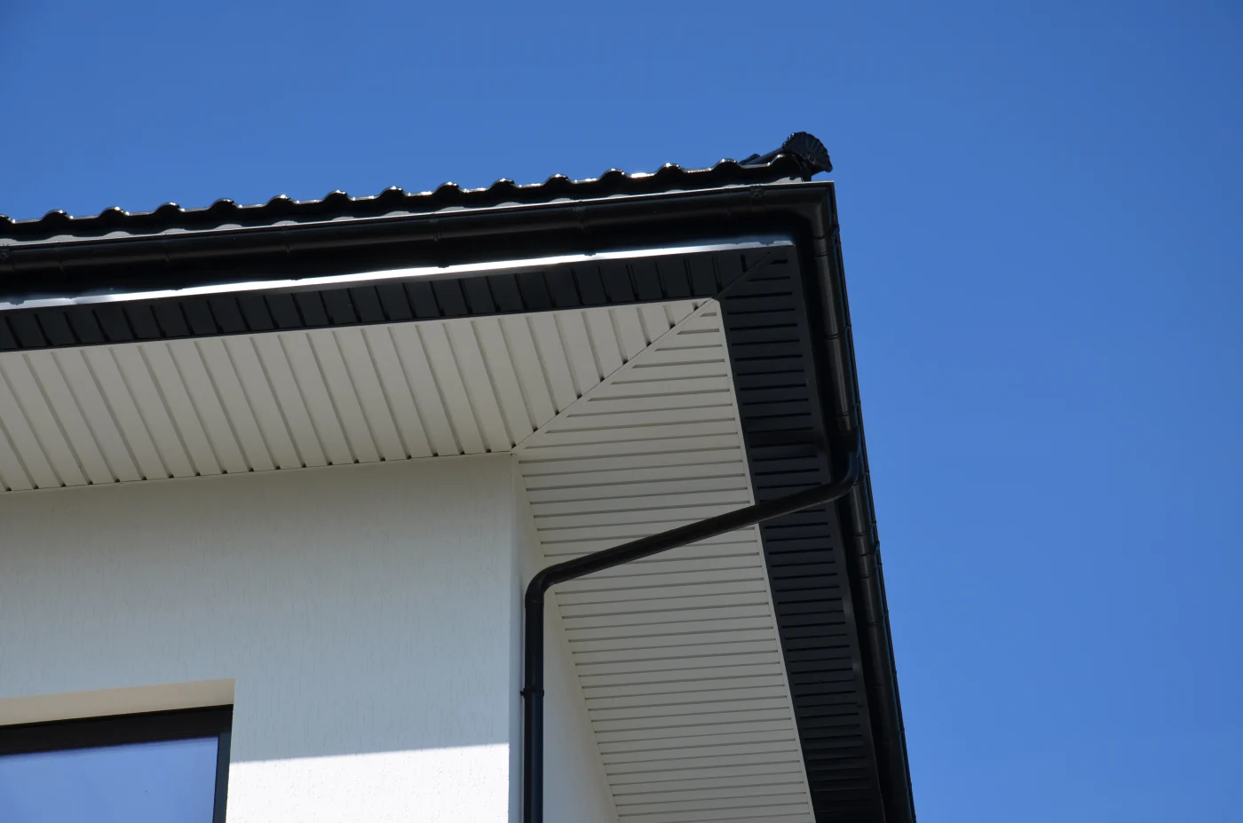 A far away shot capturing entire home with brand new siding.